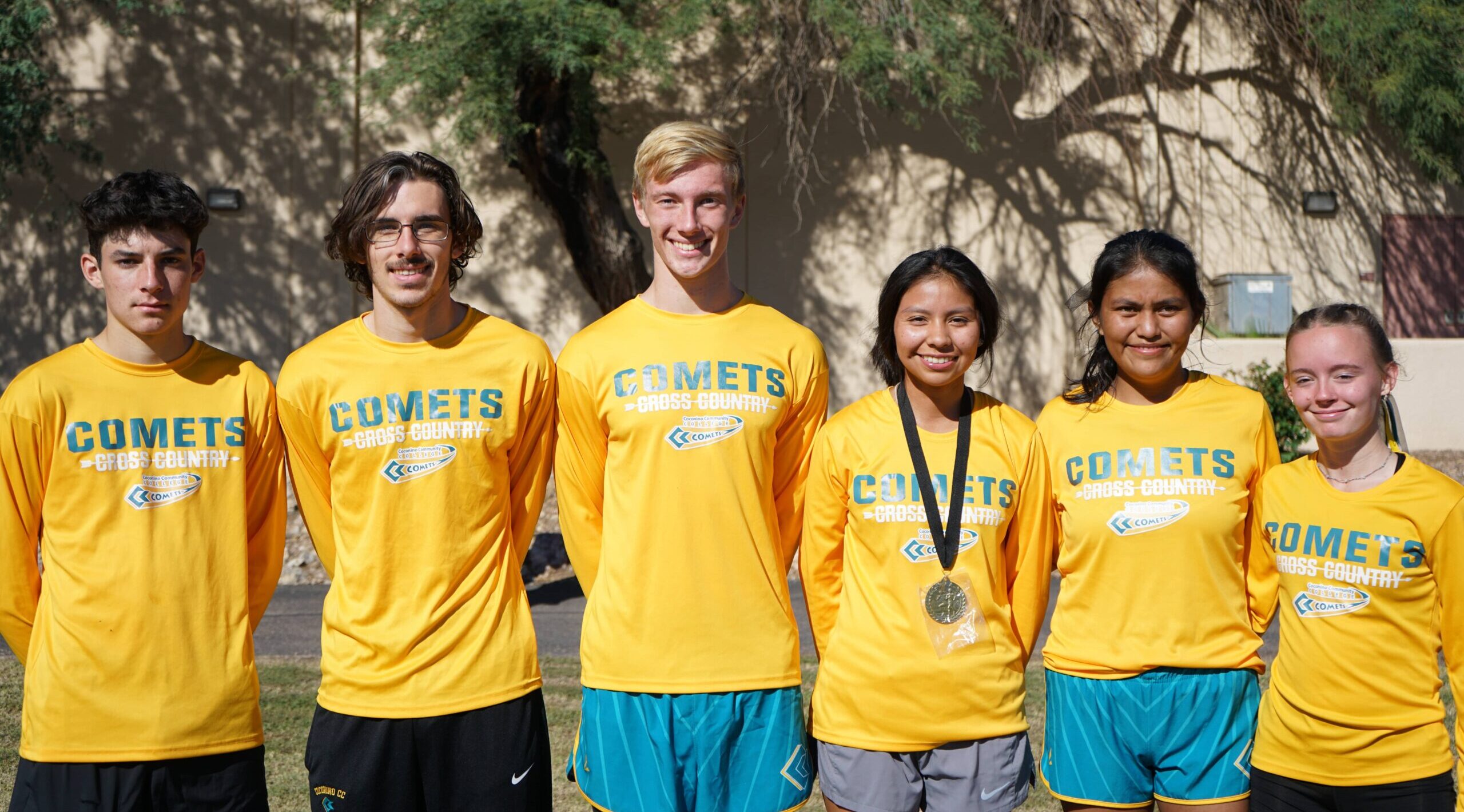 CCC Cross Country posing as a group after a race.