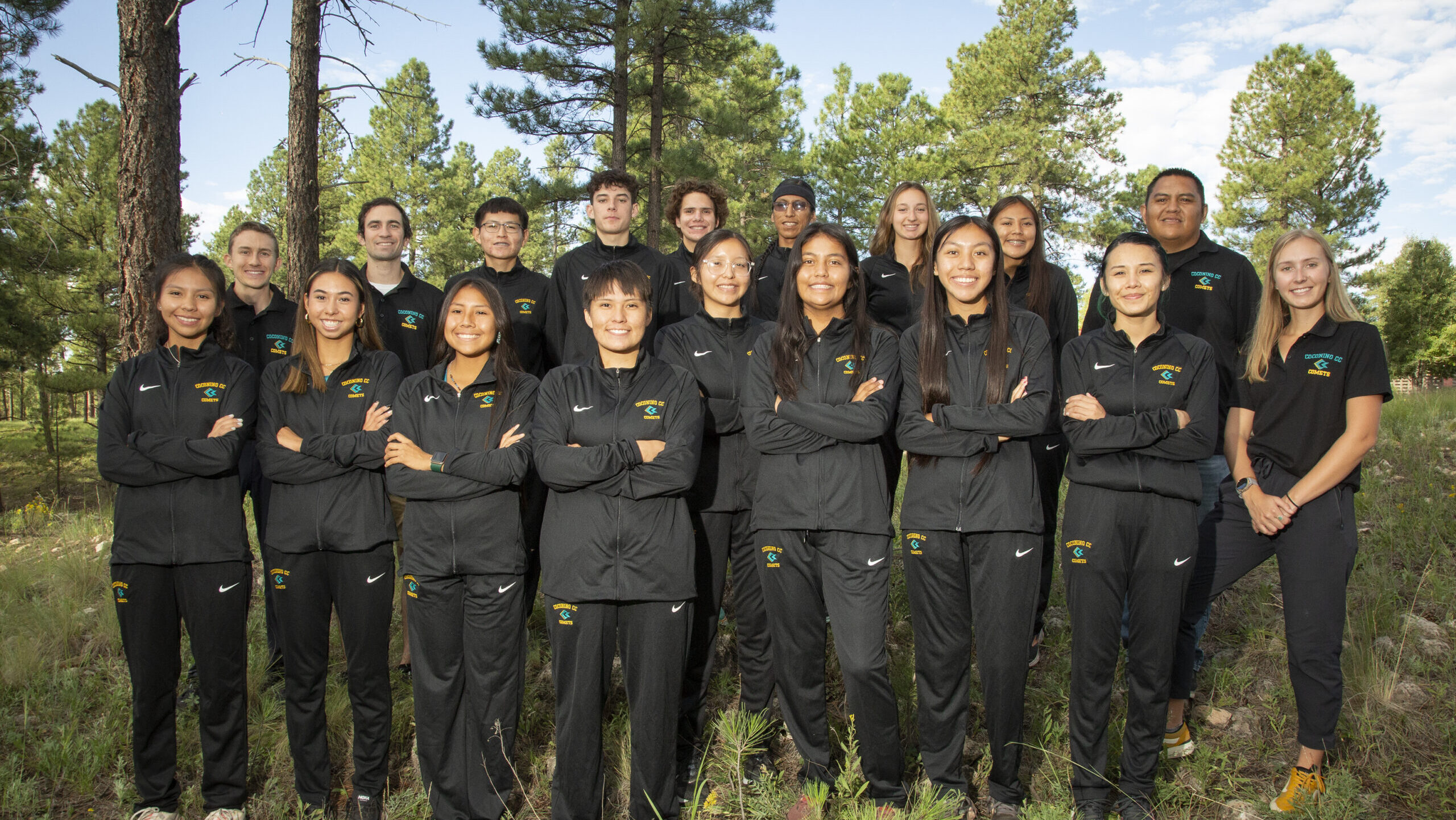 CCC men's and women's cross country teams pose for a team photo.