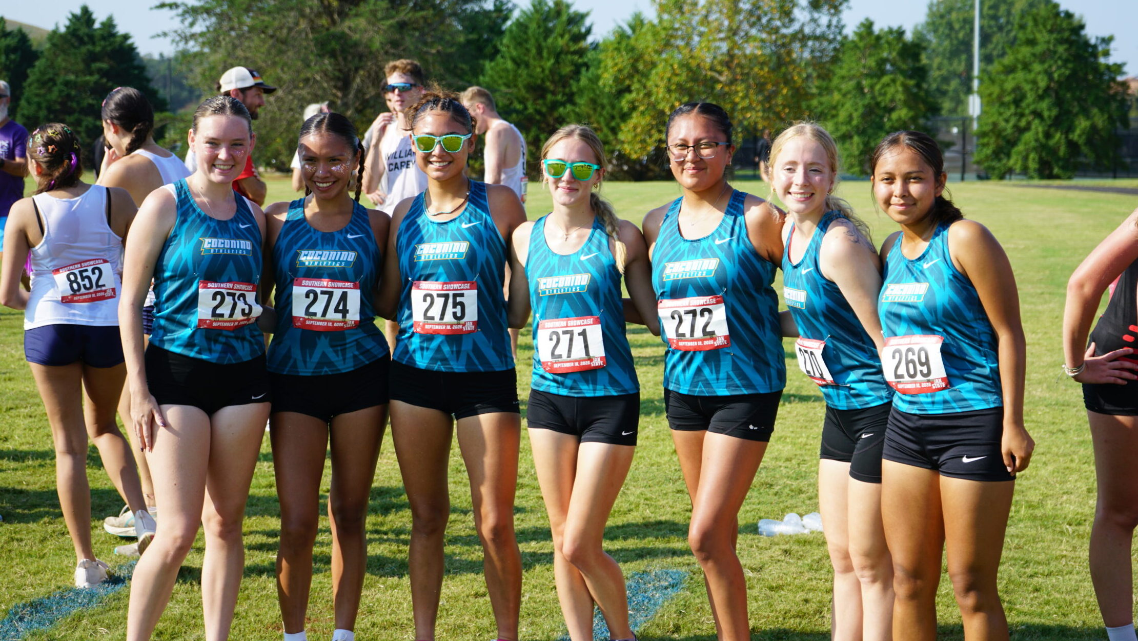 Women's cross country team poses for a group photo