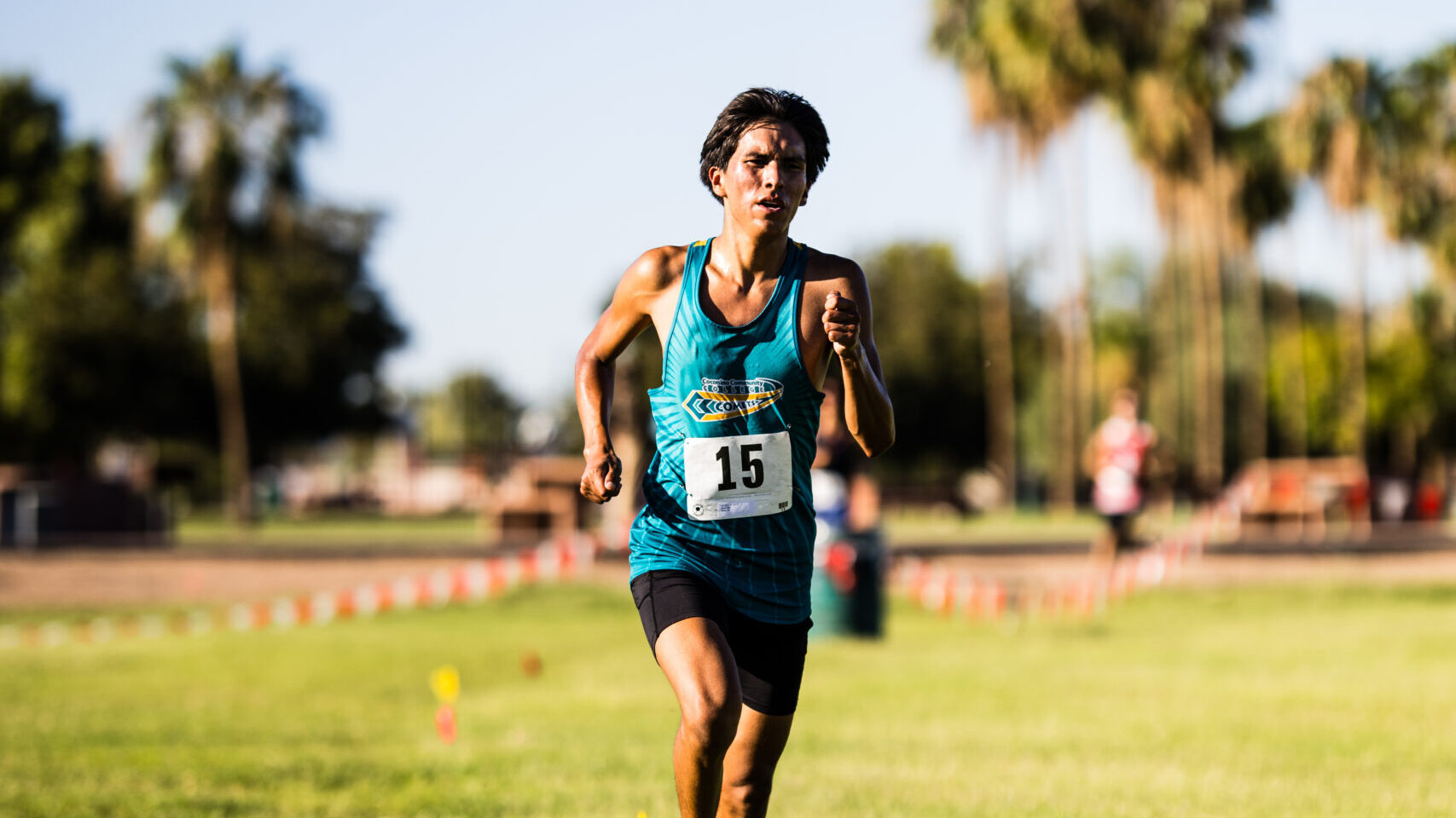 Runner racing in a cross country race.