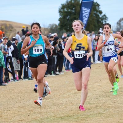 Sierra Manygoats (Left), of Coconino Community College races to the finish line of the 2023 DII National Championships.