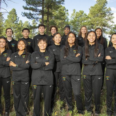 CCC men's and women's cross country teams pose for a team photo.